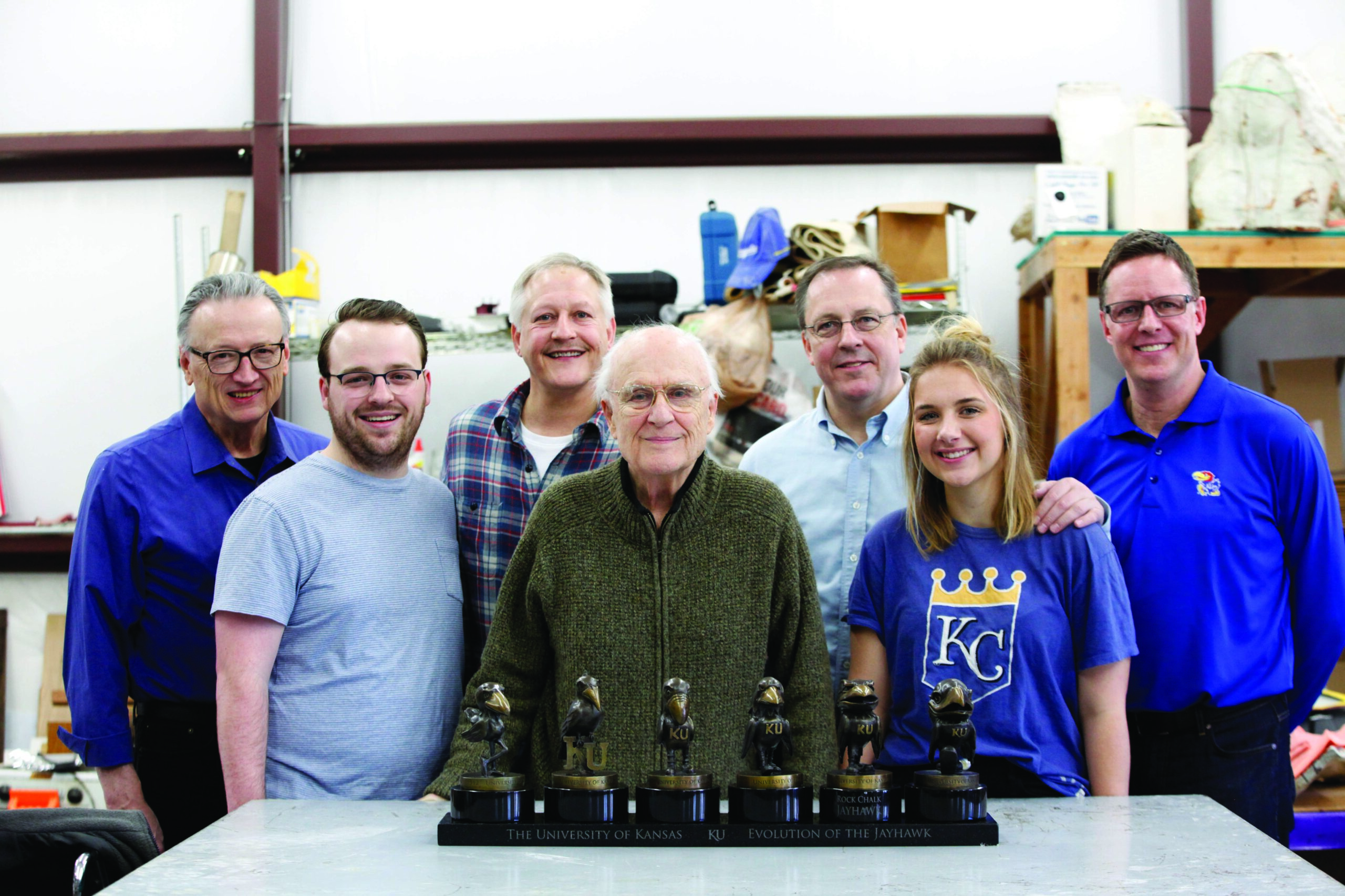 Artist Robin Richerson, Andrew Ascher, James Ascher Jr., James Ascher Sr., Christopher Ascher, Mary Ascher and Matt Palmer of ICON Artworks get a preview of the bronze Jayhawks in miniature.

Photo by Mike Yoder