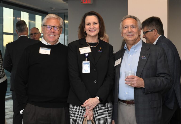 KU Advancement Board Member Michael Tracy, KU Endowment Vice President for Medical Development Nell Lucas, and Ever Onward Campaign Chairman Howard Cohen